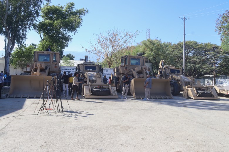 The two backhoe loaders and two wheel loaders donated to the Haitian National Police by the U.S. government were delivered at the General Directorate of the PNH in Port-au-Prince on Monday, Feb. 10, 2025. Photo by Dieugo André for The Haitian Times